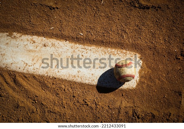 Baseball on\
pitcher\'s mound of baseball\
field