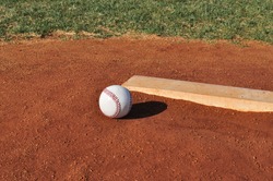 Baseball On The Pitcher's Mound Near The Pitching Rubber