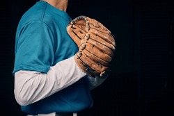 Baseball Pitcher, Hand And Glove In Studio For Sport, Training And Throwing By Black Background. Man, Cropped And Hands For Exercise, Strikeout Or Athlete With Sports, Game Or Competition For Workout