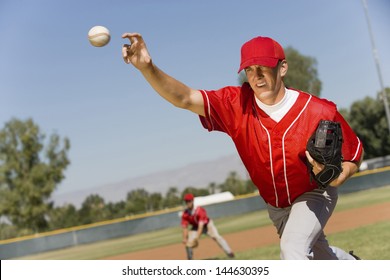 Baseball Pitcher Throwing A Ball