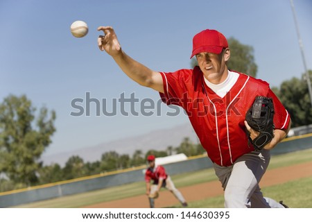 Baseball pitcher throwing a ball