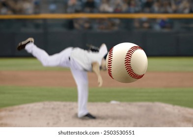 Baseball pitcher throwing fast ball to batter in a stadium - Powered by Shutterstock