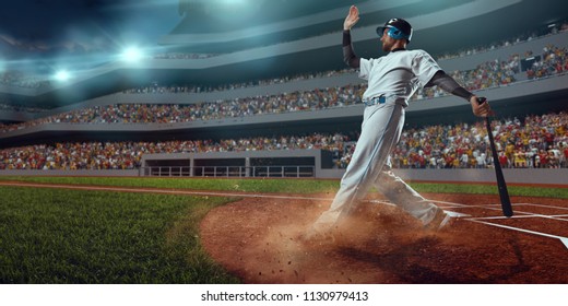 Baseball player bat the ball on professional baseball stadium - Powered by Shutterstock