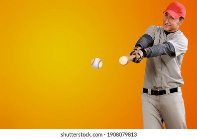 Baseball Player With Bat Beat The Ball In Action.