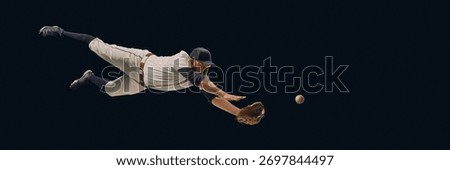 Baseball player diving full stretch catching ball midair. Concept of athletic dedication, fielding precision, professional sports visuals for training and editorial use. Banner