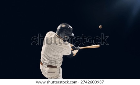 Baseball player hitting ball with bat during game action on dark background. Concept of peak athletic performance, coordination, and motion dynamics for sports promotion and media.