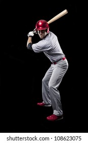 Baseball Player On A Black Background.