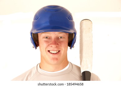 Baseball Player Portrait Smiling Holding A Bat