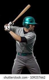 Baseball Player Ready To Swing, On A Blue Uniform.