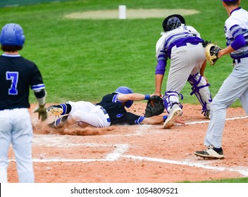 Baseball Player Sliding Safely Into Base