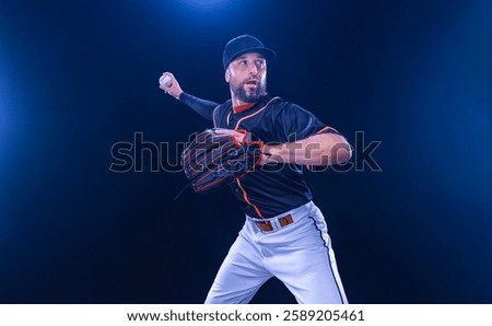 Baseball player throws. Professional baseball player on grand arena. Ballplayer on stadium in action.
