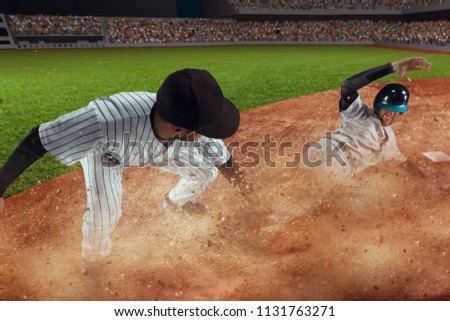 Baseball players on professional dramatic stadium. Baseball tagged out