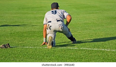 Baseball players playing the sport they love at a small stadium of the minor leagues - Powered by Shutterstock