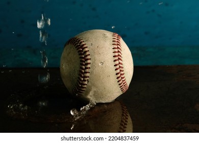 Baseball Rain Game Concept With Ball In Water.