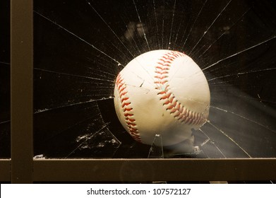 Baseball Shatters Window.