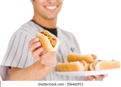 Baseball: Smiling Player Holds Out Hot Dog