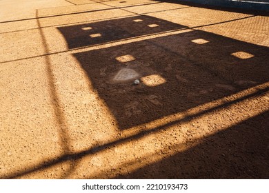 Baseball and softball field dirt with shadows
