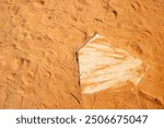 Baseball softball home plate in the infield dirt view from above