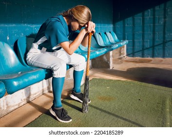 Baseball, Sports Bench And Woman Athlete Angry Thinking Of Game Loss While Waiting To Play. Frustrated, Sad And Serious Softball Player Girl In Depressed Mood For Professional Match Failure.