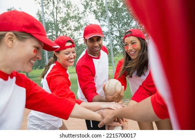 Baseball team cheering in field - Powered by Shutterstock