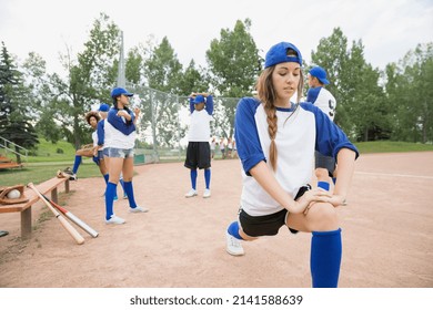 Baseball team stretching before game - Powered by Shutterstock