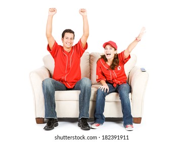 Baseball: Two Fans Cheer On Team From Couch