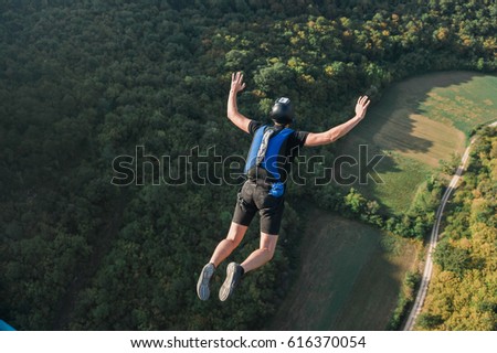 Basejumper jumping from the bridge