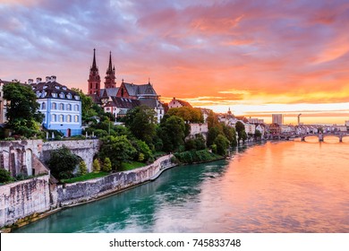 Basel, Switzerland.  Old town with Munster cathedral on the Rhine river at sunset.