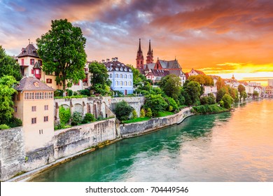 Basel, Switzerland. Old town with red stone Munster cathedral on the Rhine river. - Shutterstock ID 704449546
