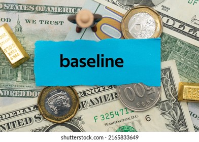 Baseline.The Word Is Written On A Slip Of Paper,on Colored Background. Professional Terms Of Finance, Business Words, Economic Phrases. Concept Of Economy.