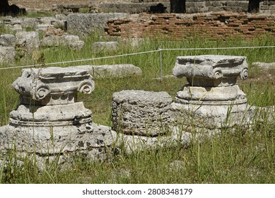The bases and the ionic capitals of columns that were part of a guesthouse (Leonidaion) for wealthy visitors and participants to the ancient Olympic Games in Olympia, Greece, that was constructed around 330 BC covering an expansive area of over 6000 square meters