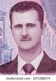 Bashar al-Assad portrait from Syrian money 
