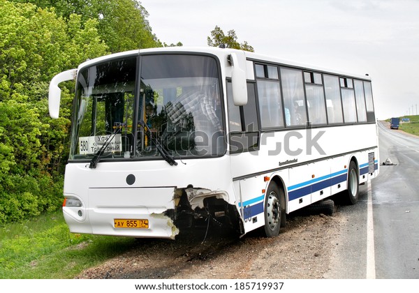 BASHKORTOSTAN, RUSSIA - MAY 24, 2009: Accident\
of the white KAVZ 4238 Aurora interurban coach at the interurban\
freeway.