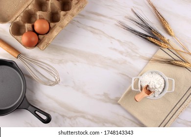 Basic Baking Equipment/Utensils and Ingredients, Egg, Whisker, Measuring Cups, Flour. Good for Wallpaper and Background - Powered by Shutterstock