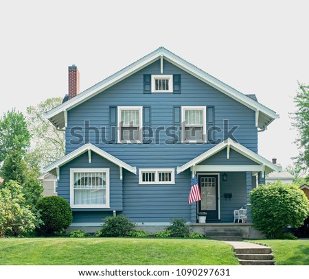 Basic Blue House with Small Porch & White Trim