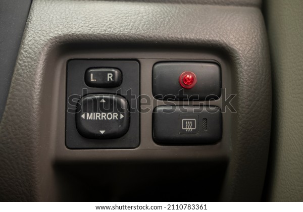 basic car or vehicle  control panel for lights,
windows, and side mirror.
