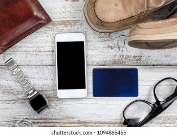Basic daily objects on white faded wood in flat lay view