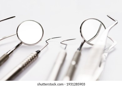 Basic Dentist Tools On White Background.