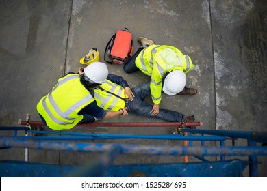 Basic first aid training for support accident in site work, Builder accident fall scaffolding to the floor, Safety team help employee accident. - Shutterstock ID 1525284695