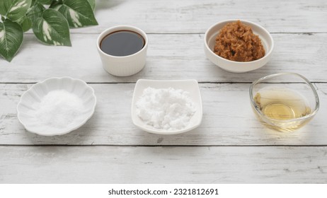A basic Japanese seasoning. Sugar, salt, vinegar, soy sauce and miso. - Shutterstock ID 2321812691