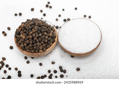 Basic kitchen spices for cooking isolated on white background, pepper and salt - Powered by Shutterstock