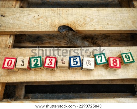 Basic numbers represented on wooden cube