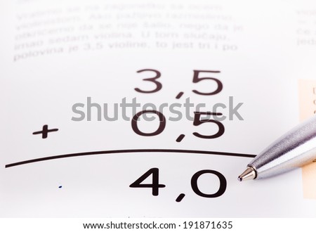 Basic summing of decimal numbers with pencil pointing at result