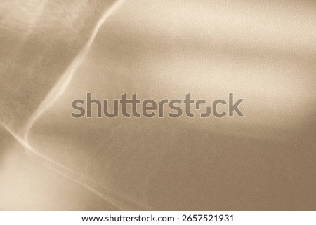 Basic template,seasonal concept of summer background with glare and sunrays reflections,defocused blurred transparent texture.Imitation of water surface,sandy beach,desert for travel,eco design,nature