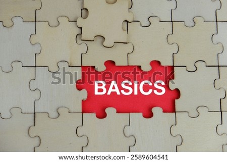 BASIC words from missing wooden puzzle on red background , ethics moral philosophy concept, bright background