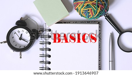 BASICS Conceptual background with office tools on white background