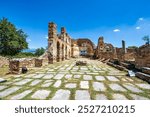 The Basilica of Agios Achilleios, a ruined 10th-11th century Christian church, located on Agios Achilleios Island in Lake Mikri Prespa, Greece.