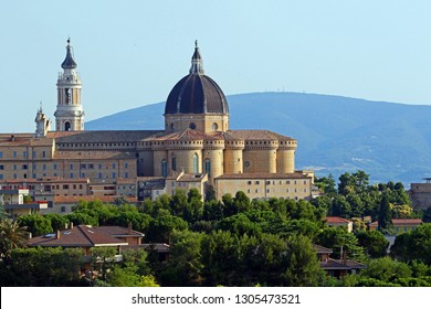 The basilica of the holy house or santuario della santa casa in Loreto province of Ancona in Le Marche Italy with Monte Conero behind a place of pilgrimage for Catholics and twinned with Lourdes