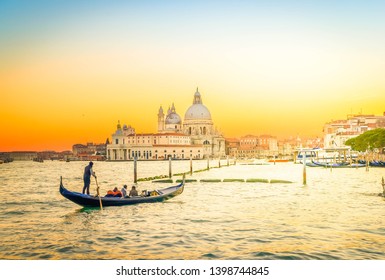 Basilica Santa Maria della Salute and lagoon water at sunset, Venice, Italy, retro toned