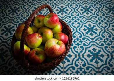 Basket Of Apple On Kitchen Tile Floor, Vignette Frame